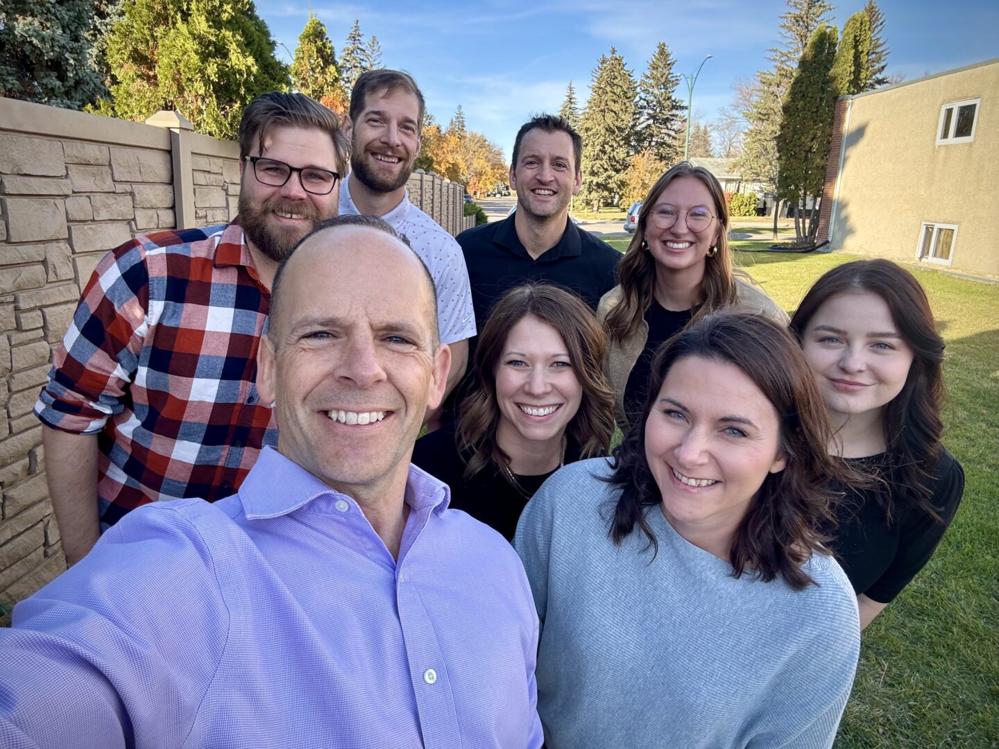 North 49 Physical Therapy team members smiling for a selfie photo.